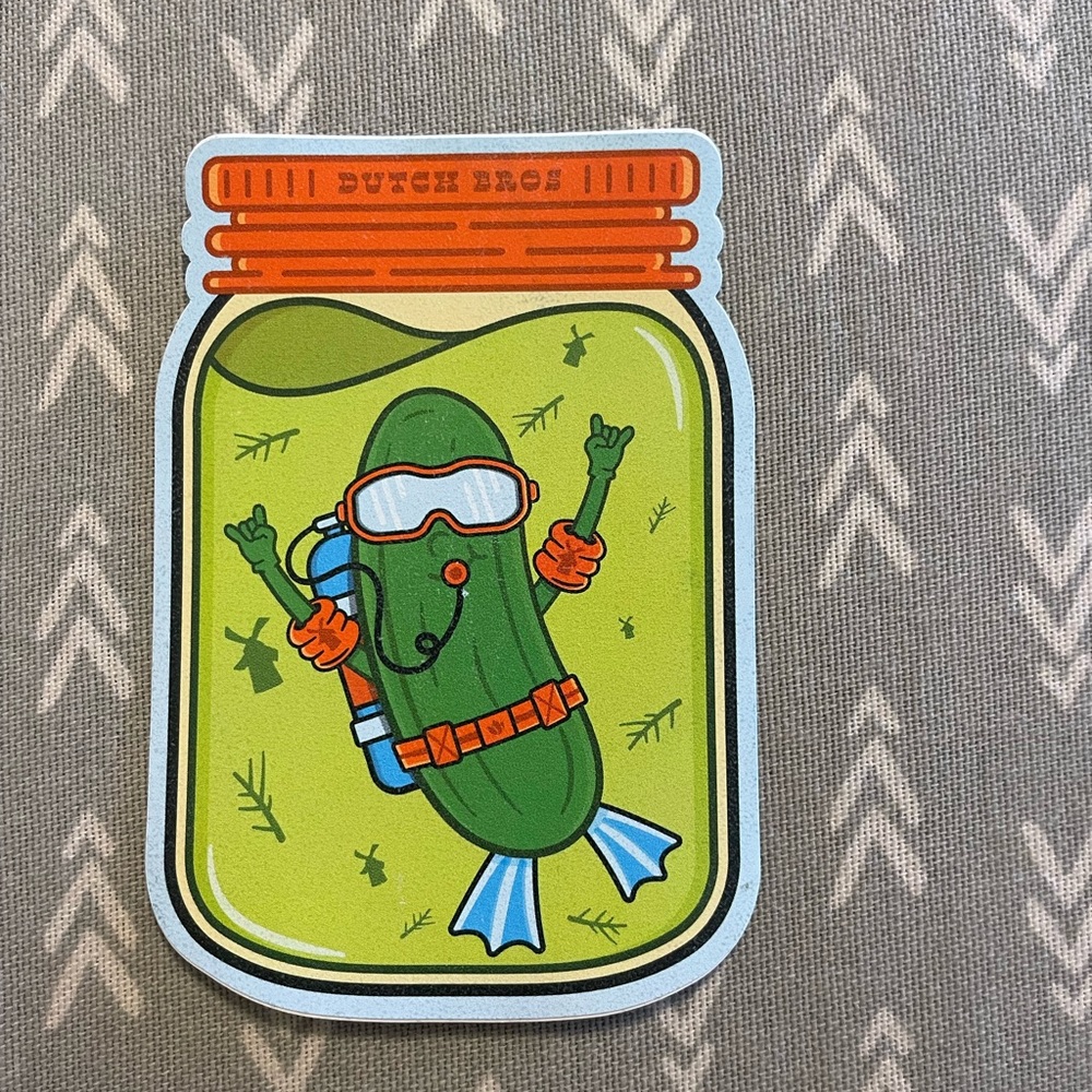 Dutch Bros Scuba Pickle Sticker with Green and Orange scratch and sniff